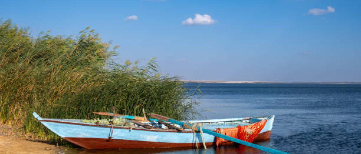 Fishing boat on morris lake in Fayoum Oasis , Egypt